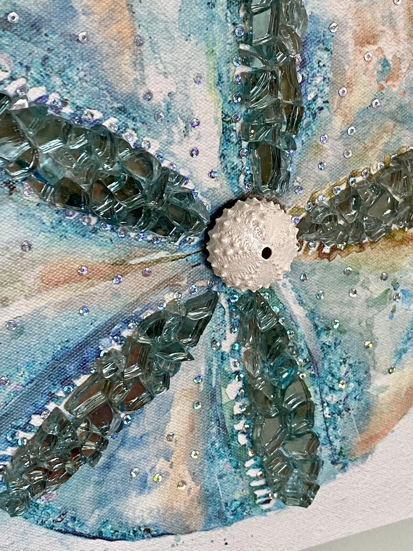 Sand dollar coastal wall hanging with sparkling fire glass