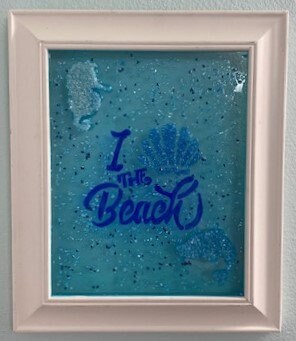 Framed I love the Beach Wall Hanging with shell, seahorse, and dolphin in crushed glass